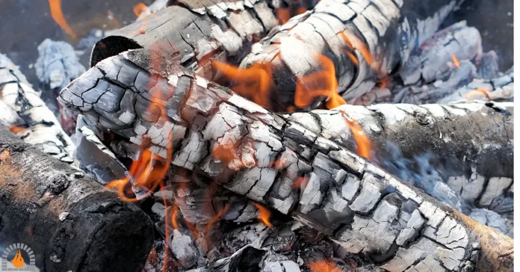fireplace burning woods.